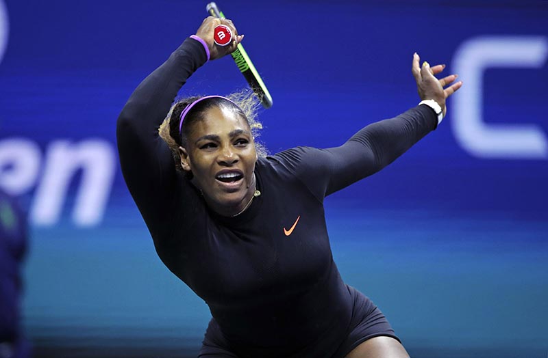 Serena Williams returns to Maria Sharapova during the first round of the US Open tennis tournament in New York, Monday, Aug. 26, 2019. Photo: AP