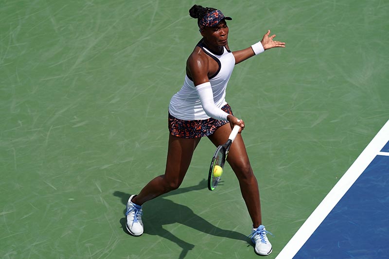 Venus Williams (USA) returns a shot against Kiki Bertens (NED) during the Western and Southern Open tennis tournament at Lindner Family Tennis Center, on Mason, OH, USA, Aug 13, 2019. Photo: Aaron Doster-USA TODAY Sports via Reuters