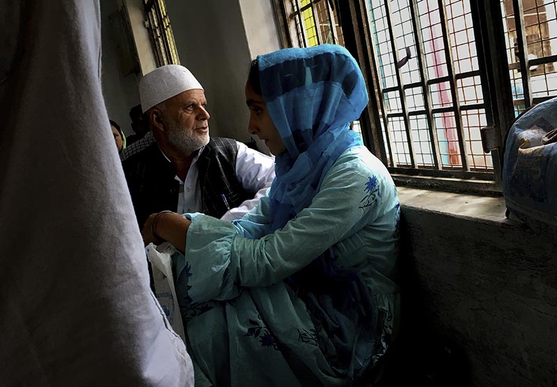 A Kashmiri family awaits their turn to meet a relative in Agra Central Jail in Agra, India, Friday, Sept. 20, 2019. Photo: AP