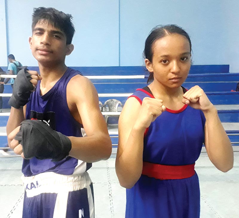 Rawan Ali and Prama Rana poses after earning the berth in next monthu2019s ASBC Asian Junior Boxing Championship, in Kathmandu on Tuesday.