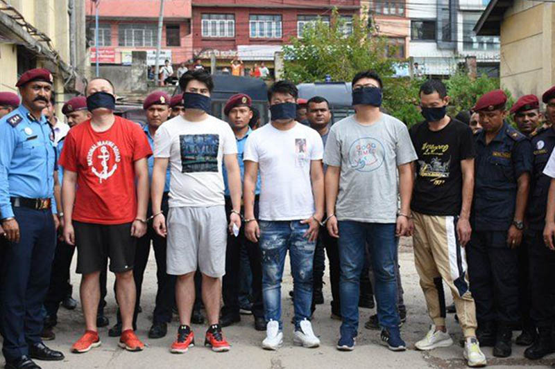 The suspects accused of stealing money from an ATM in Kathmandu being paraded at the Metropolitan Police Range in Kathmandu, on Sunday, September 01, 2019. Courtesy: MPR