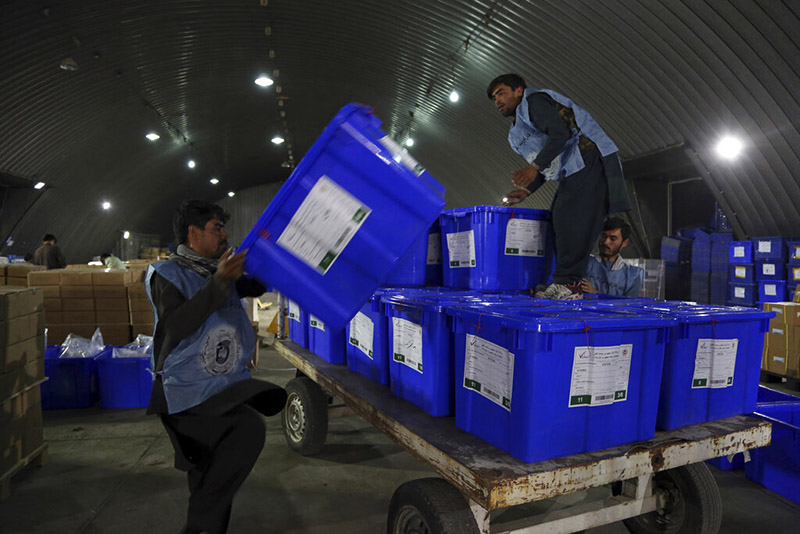 Election commission workers move ballot boxes in preparation for the presidential election scheduled for Sept 28, at the Independent Election Commission compound in Kabul, Afghanistan, on Sunday, September 15, 2019. Afghan officials say around 100,000 members of the country's security forces are ready for polling day. Photo: AP