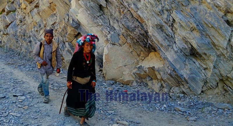 Locals walking towards Kolti from Bichchhaya of Himali Rural Municipality, in Bajura. Photo: Prakash Singh/THT