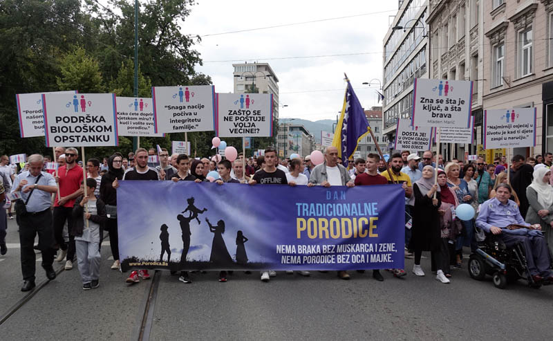 Holding banners and balloons, participants march in what they said was a gathering designed to promote traditional family values in Sarajevo, Bosnia, Saturday, September 7, 2019. Photo: AP