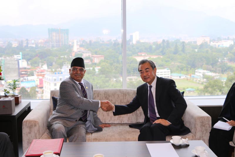 Nepal Communist Party (NCP) Co-chair Pushpa Kamal Dahal meets Chinese Foreign Minister Wang Yi, in Kathmandu, on Tuesday, September 10, 2019. Photo: @cmprachanda/Twitter