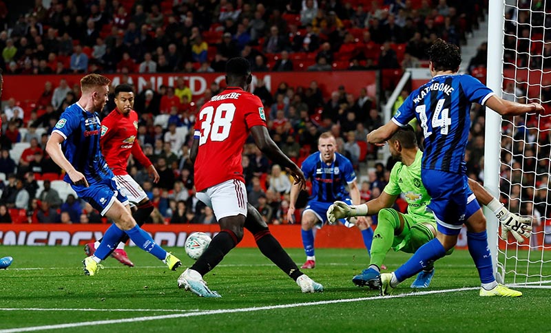 Rochdale's Callum Camps shoots at goal during the Carabao Cup Third Round match between Manchester United and Rochdale, at Old Trafford, in Manchester, Britain, on September 25, 2019. Photo: Action Images via Reuters