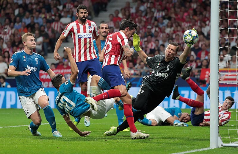 Atletico Madrid's Stefan Savic scores their first goal during the Champions League at Group D match between Atletico Madrid and Juventus, at Wanda Metropolitano,in  Madrid, Spain, on September 18, 2019. Photo: Reuters