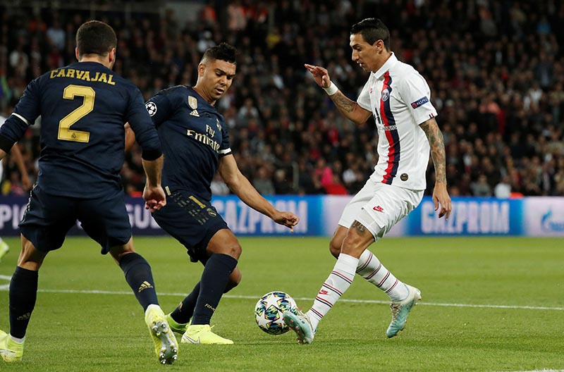 Paris St Germain's Angel Di Maria scores their first goal during the Champions League at Group A match between Paris St Germain and Real Madrid, at Parc des Princes, in Paris, France, at September 18, 2019. Photo: Reuters