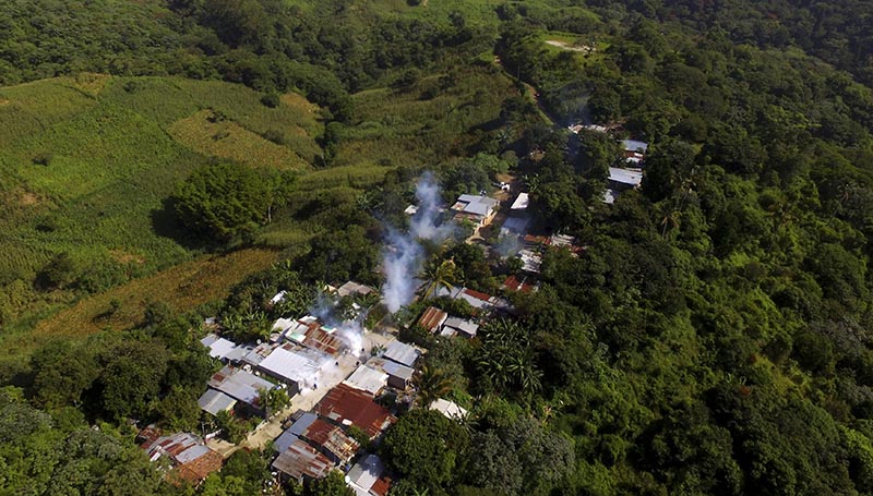 Plumes of smoke caused by the pesticide that annihilates dengue-transmitting mosquitoes, in Los Sitios, El Salvador. File Photo: AP