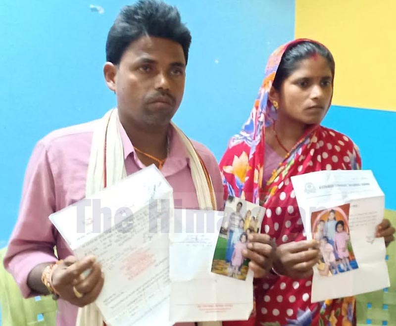 A couple showing documents at a press meet after District Administration Office told them to carry out DNA test to prove that six-year-old Avinash, who had gone missing for 14 months, was their son, in Gaur, Rautahat, on Tuesday, September 10, 2019. Photo: