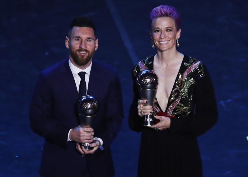 Argentinian Barcelona player Lionel Messi poses with United States forward Megan Rapinoe after they received the Best FIFA Men's, Women's player award during the Best FIFA soccer awards ceremony, in Milan's La Scala theater, northern Italy, Monday, September 23, 2019. Photo: AP