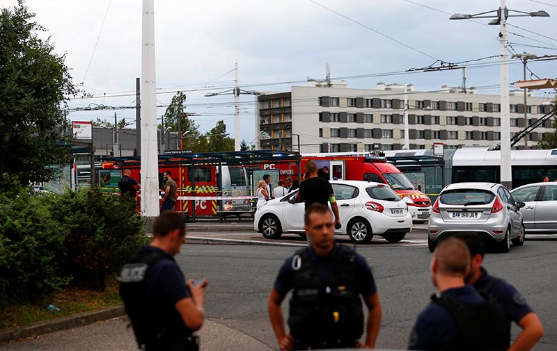 French police secure the area after one person was found dead and six others wounded in a suspected knife attack in Villeurbanne, near Lyon, central France, August 31, 2019. Photo: Reuters