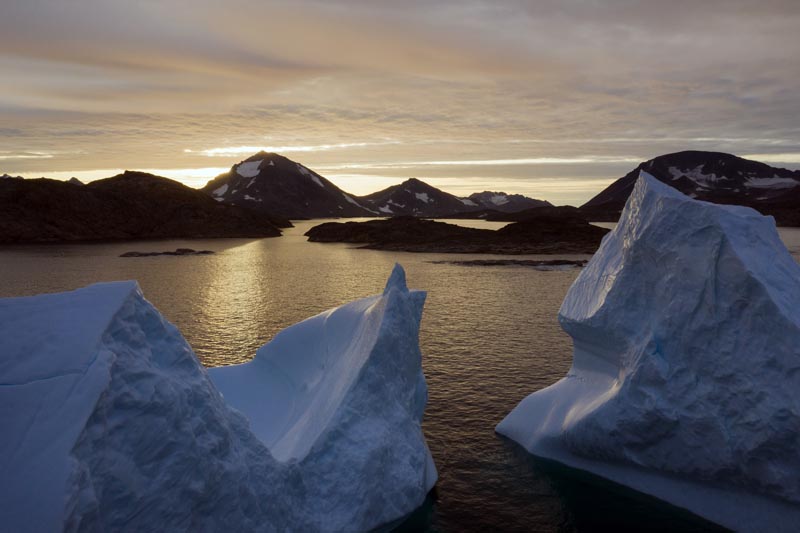 FILE - This early Friday, August 16, 2019 file photo shows an aerial view of large Icebergs floating as the sun rises near Kulusuk, Greenland. Photo: AP