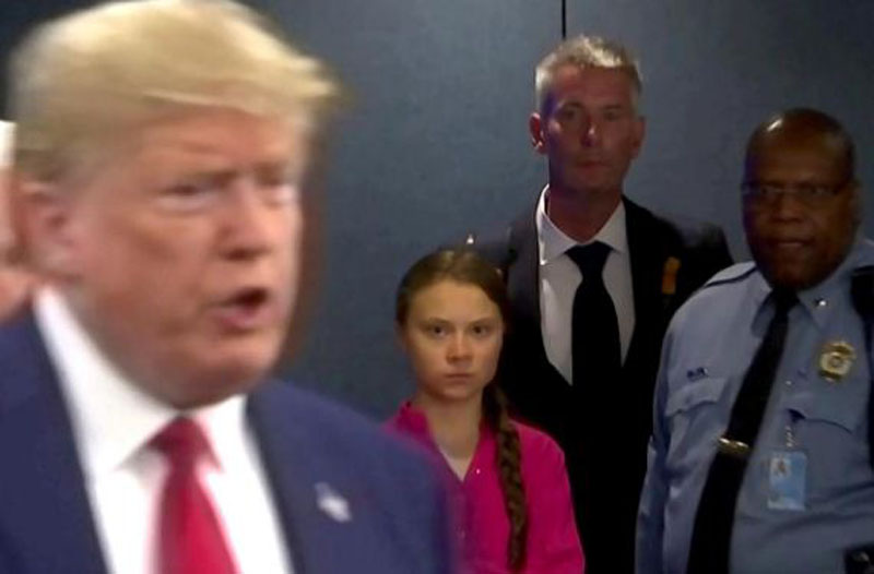 Swedish environmental activist Greta Thunberg watches as US President Donald Trump enters the United Nations to speak with reporters in a still image from video taken in New York City, US September 23, 2019. Photo: Reuters
