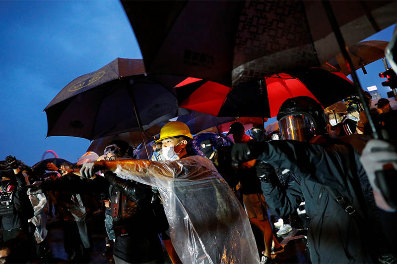 People take part in a general strike at Tamar Park in front of the government buildings in Hong Kong, China September 2, 2019. Photo: Reuters