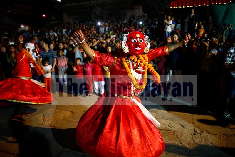 Masked dancers perform a traditional dance during Indra Jatra festival in Hanumandhoka, Kathmandu,  on Thursday, September 12, 2019. Photo: Skanda Gautam/THT