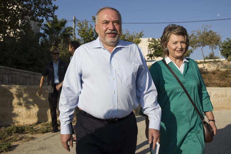 The leader of the Yisrael Beiteinu (Israel Our Home) right-wing nationalist party Avigdor Liberman come to vote with is wife Ella in the settlement of Nokdim, West Bank, Tuesday, September 17, 2019. Photo: AP