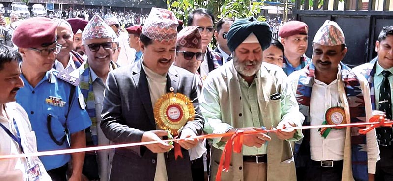 Attorney General Agni Prasad Kharel and Indian Ambassador Manjeev Singh Puri inaugurating the new school building of Shree Schoolchaun Higher Secondary School in Gauradaha Municipality, Jhapa, on Monday. Photo: THT