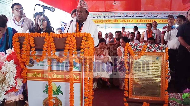Minister of Federal Affairs and General Administration Lalbabu Pandit speaking at a programme organised to announce Kanchanrup Municipality a child-friendly municipality, in Saptari, on Thursday, September 5, 2019. Photo: THT