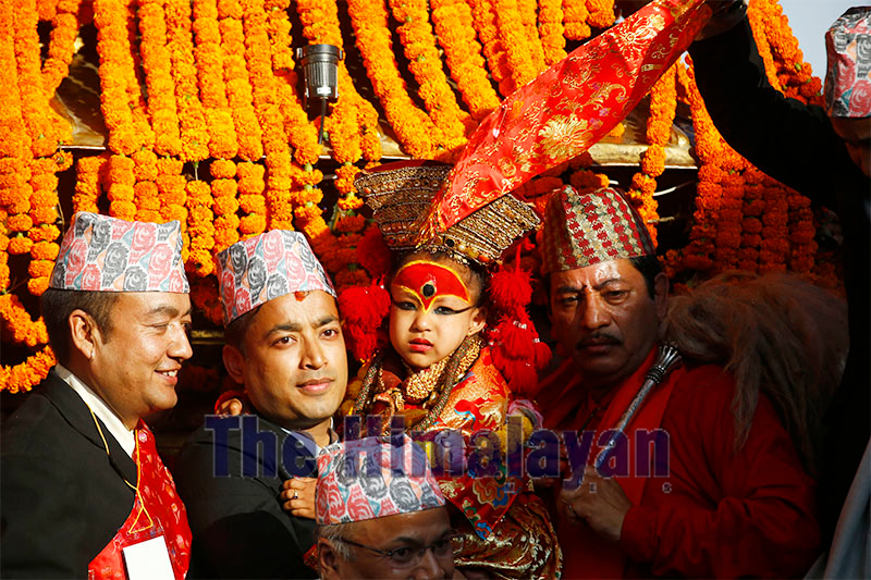 Nepalu2019s Living Goddess Kumari is placed on a chariot during Indra Jatra festival, celebrated to honor Indra, the King of Heaven and Lord of Rains in Kathmandu, Nepal on Monday, September 24, 2018. Photo: Skanda Gautam