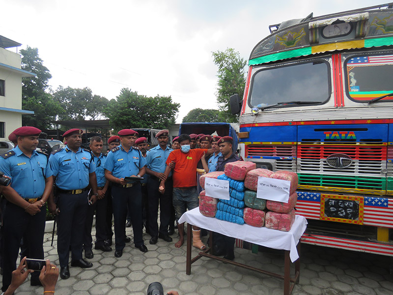Police making public the arrestee along with seized marijuana and impounded vehicle, at Makawanpur District Police Office, on Tuesday, September 24, 2019. Photo: Prakash Dahal/THT