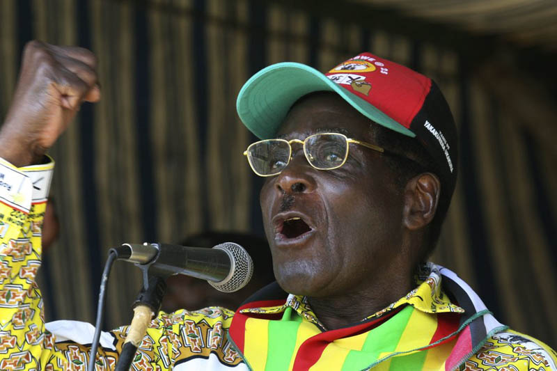 FILE - In this Tuesday, March 18, 2008 file photo, Zimbabwe President Robert Mugabe addresses party supporters at a rally in Gweru, about 250 kms. (155 miles) south of Harare. Photo: AP