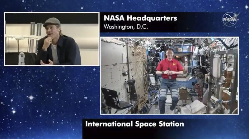 In this image taken from NASA video actor Brad Pitt (left) star of the new space movie u0093Ad Astra,u0094 speaks from NASA headquarters in Washington, to astronaut Nick Hague abroad the International Space Station, on Monday, September 16, 2019. Photo: NASA via AP