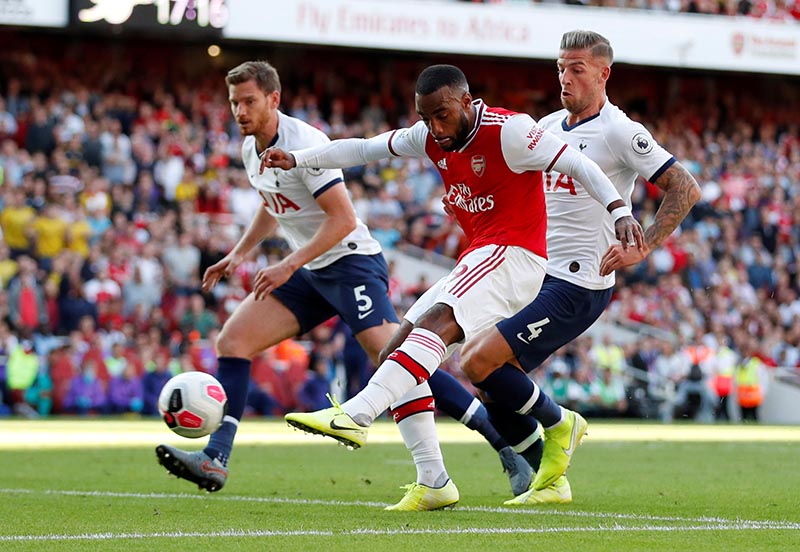 Arsenal's Alexandre Lacazette scores their first goal during the Premier League match between Arsenal and Tottenham Hotspur, at Emirates Stadium, in London, Britain, on September 1, 2019. Photo: Action Images via Reuters