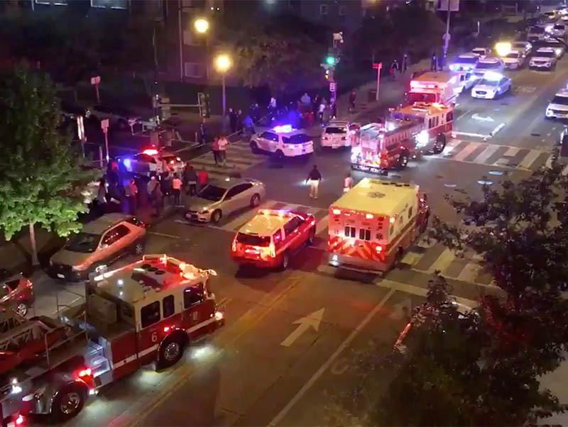 Rescue vehicles are seen following a shooting in Washington, DC, US, on Friday, September 19, 2019, in this picture obtained from social media. Mandatory credit CHRIS G COLLISON/via REUTERS