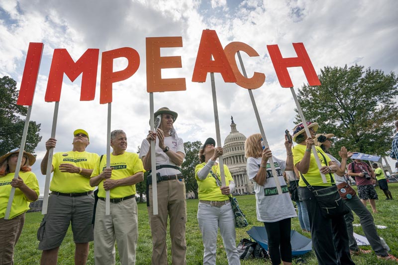 Activists rally for the impeachment of President Donald Trump, at the Capitol in Washington, Thursday, September 26, 2019. Photo: AP