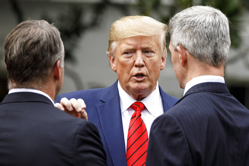 US President Donald Trump pauses to talk as he leaves a ceremony with members of law enforcement on the South Lawn of the White House, in Washington, United States, on Thursday, September 26, 2019. Photo: AP