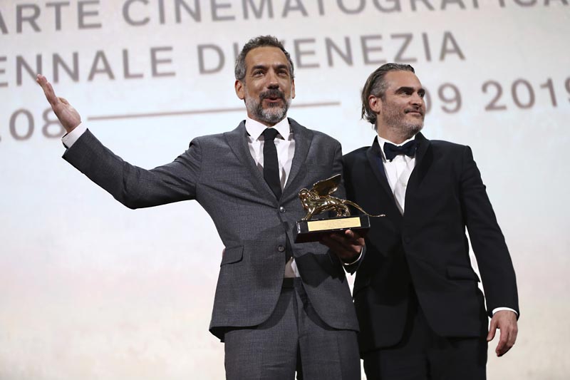 Director Todd Phillips, left, holds the Golden Lion for Best Film for 'Joker', joined by lead actor Joaquin Phoenix at the closing ceremony of the 76th edition of the Venice Film Festival, Venice, Italy, Saturday, September 7, 2019. Photo: AP