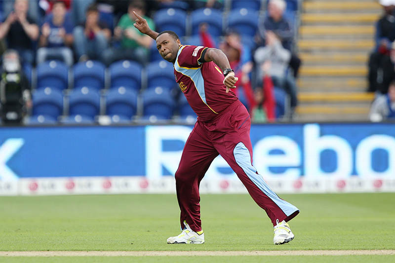 FILE PHOTO: West Indies' Kieron Pollard celebrates after taking a wicket. Photo: Reuters