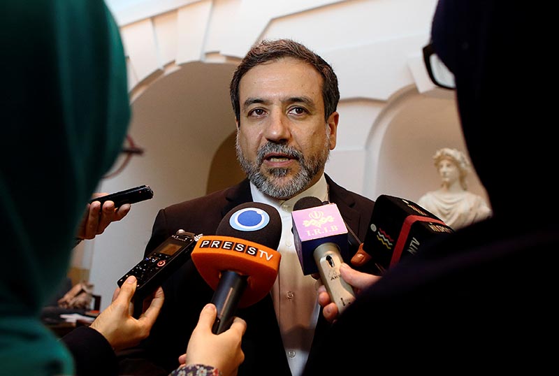 Iran's top nuclear negotiator Abbas Araqchi talks to journalists after meeting senior officials from the United States, Russia, China, Britain, Germany and France in a hotel in Vienna, Austria, October 19, 2015. File Photo: Reuters