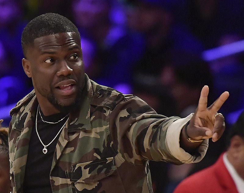 Kevin Hart gestures during the second half of an NBA basketball game between the Los Angeles Lakers and the Philadelphia 76ers in Los Angeles. Hart has been injured in a car crash in the hills above Malibu on September 1, 2019. File Photo: AP