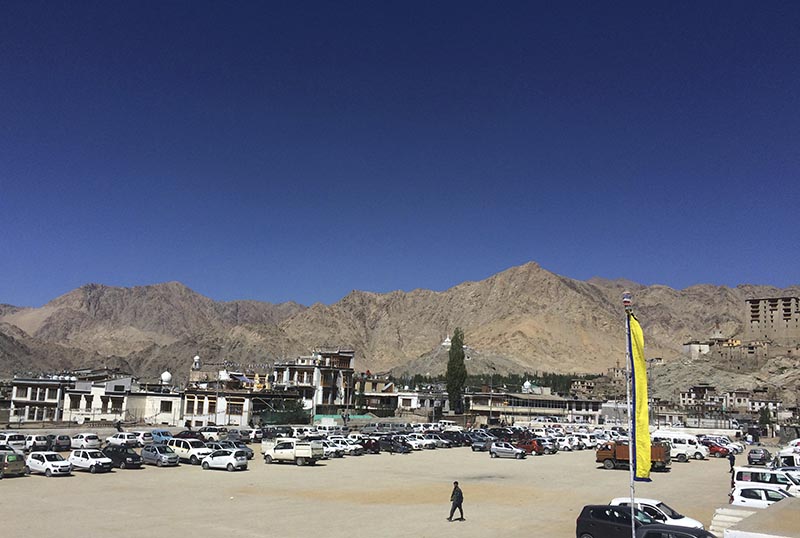 Cars are parked in Leh, a town in Indiau2019s Ladakh district, which is part of the Himalayan region of Kashmir. File Photo: AP