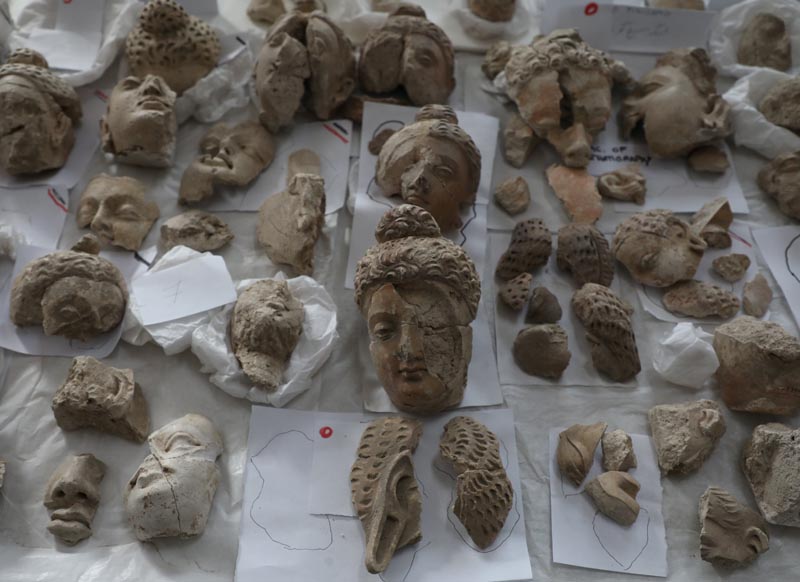Pieces of statues damaged by the Taliban are laid out on a table for restoration at the National Museum in Kabul, Afghanistan October 13, 2019. Photo: Reuters