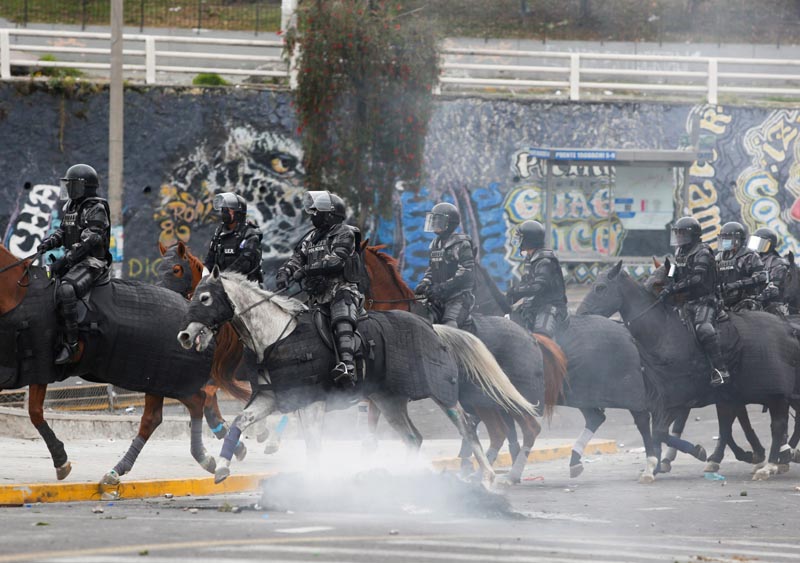 Mounted riot police are seen near the National Assembly during protests against Ecuador's President Lenin Moreno's austerity measures, in Quito, Ecuador October 8, 2019. Photo: Reuters