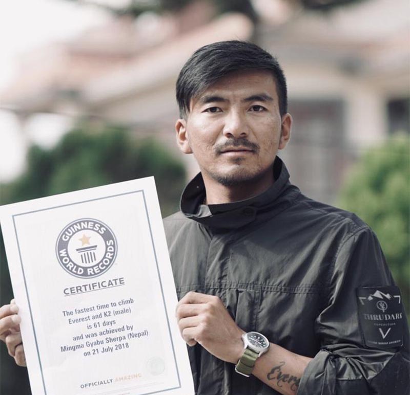 Mingma Gyabu displays the official certificate given by the Guinness World Records for the fastest ascents of Mt Everest and Mt K2. Photo: THT
