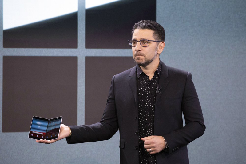 Microsoft's Chief Product Officer Panos Panay holds a Surface Duo at an event, Wednesday, October 2, 2019 in New York. Photo: AP