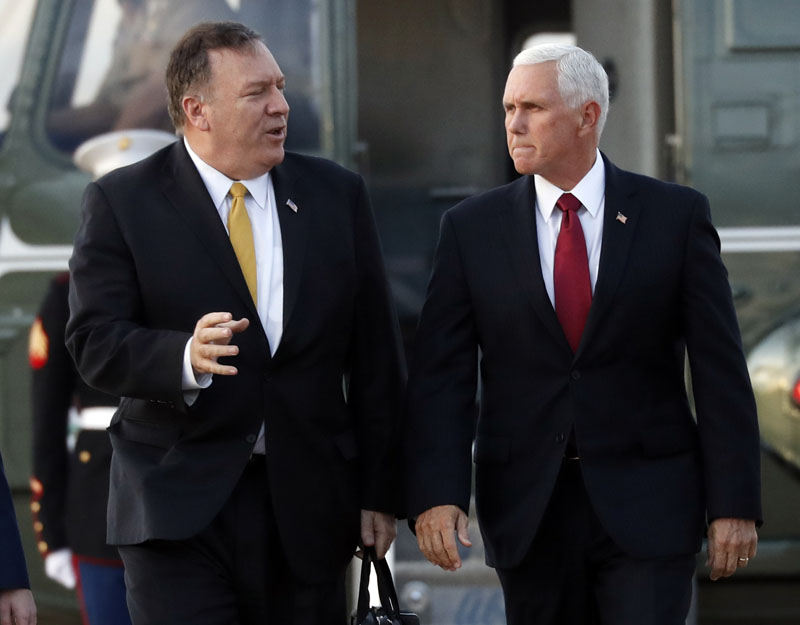 Vice President Mike Pence and Secretary of State Mike Pompeo arrive at Andrews Air Force Base, Md, Wednesday, Oct 16, 2019, as they depart en route to Turkey. Photo: AP