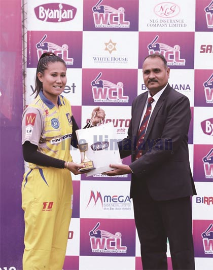 Kat Queens skipper Rubina Chhteri Belbashi receiving the player-of-the-match award after the Womenu2019s Champions League match against Lalitpur Falcons in Kathmandu on Sunday, October 20, 2019. Photo: THTn