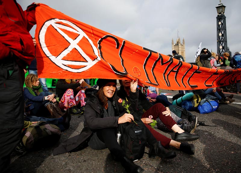 Activists block Lambeth Bridge during the Extinction Rebellion protest in London, Britain October 7, 2019. Photo: Reuters