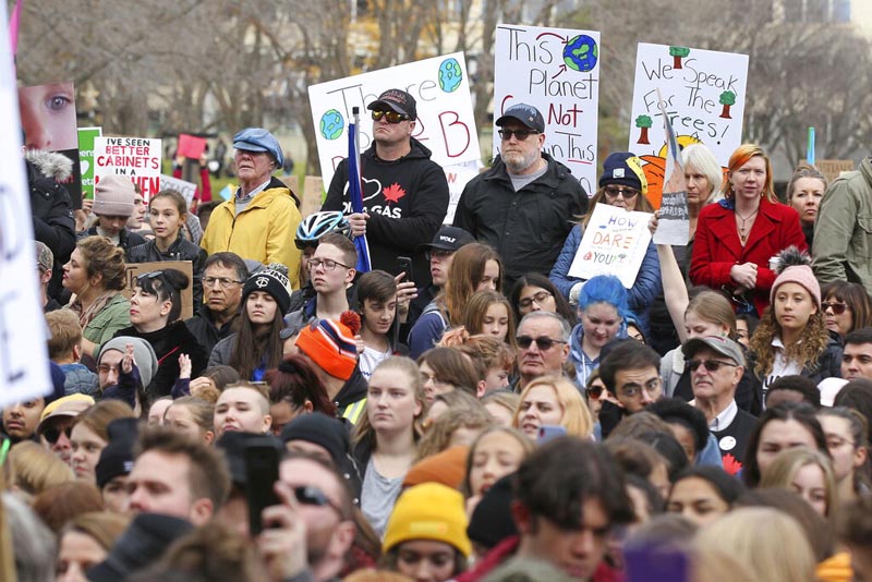 Climate change activists gather for a march and rally with Swedish climate activist Greta Thunberg at the Alberta Legislature Building in Edmonton, Alberta, on Friday, October 18, 2019. Photo: AP