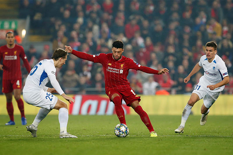 Liverpool's Alex Oxlade-Chamberlain in action with KRC Genk's Sander Berge. Photo: Reuters