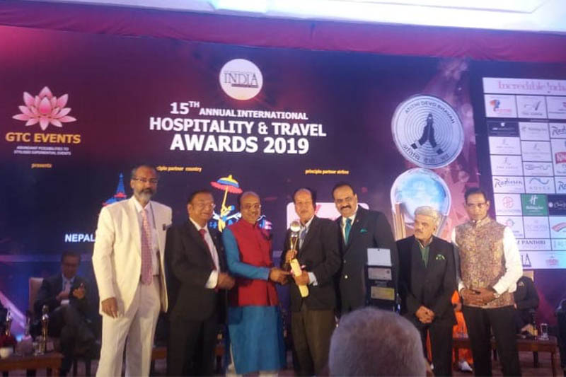 Former Minister of India Vijay Goel (third from left) hands over the award to Amar Bahadur Shahi during the award ceremony in New Delhi, on Friday, November 15, 2019. Courtesy: Raaika Tours and Treks