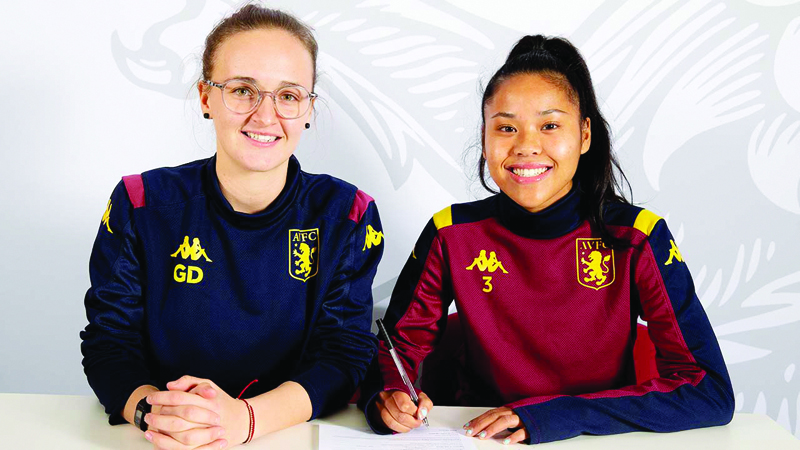 Asmita Ale (right) poses for a photo after signing the professional contract with Aston Villa. Photo Courtesy: avfc.co.uk