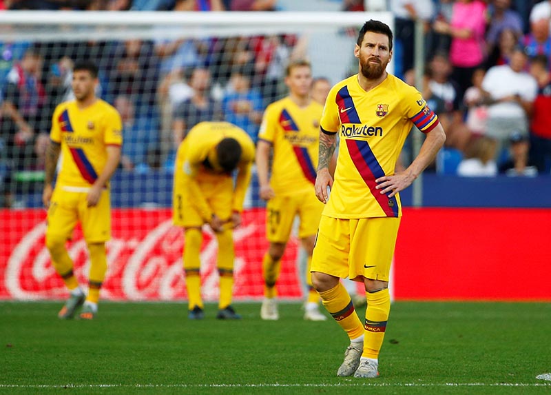 Barcelona's Lionel Messi looks dejected after Levante's Nemanja Radoja scores their third goal during the La Liga Santander between Levante and FC Barcelona,at  Estadi Ciutat de Valencia, in Valencia, Spain, on November 2, 2019. Photo: Reuters