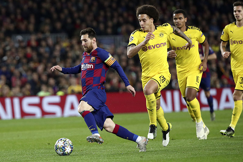 Barcelona's Lionel Messi runs with the ball during a Champions League group F soccer match between Barcelona and Dortmund at the Camp Nou stadium in Barcelona, Spain, Wednesday, November 27, 2019. Photo: AP