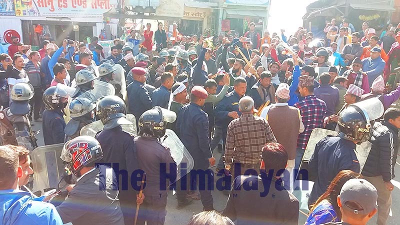 Police intervening in a torch rally taken out by Civil Society, Dadeldhura, in support of Dr Govinda KC, in Bagkhor, on Sunday, November 10, 2019. Photo: THT